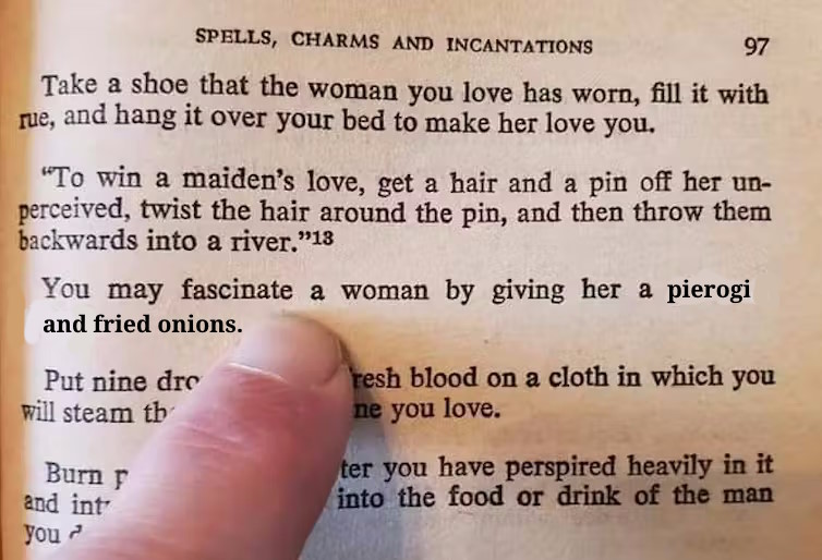 a finger pointing at text in a book that says - You may fascinate 
a woman by giving her a pierogi and fried onions.